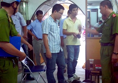 The two men impersonating as reporters (striped blue shirt and yellow T-shirt) The two men impersonating as reporters (striped blue shirt and yellow T-shirt)